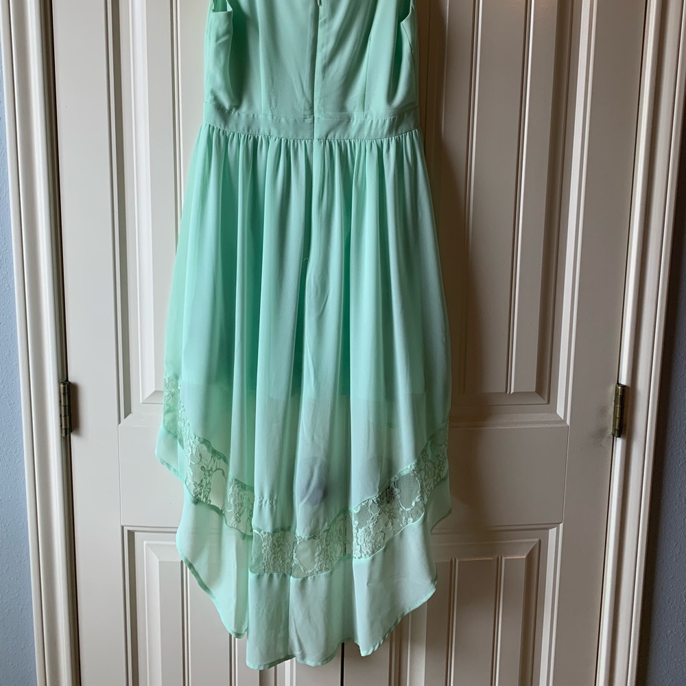 Gorgeous Turquoise High Low dress w/ lace detail.